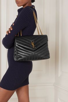 SAINT LAURENT's 'Loulou' bag is the perfect size for every day, so none of your essentials need to be left behind. Made in Italy from smooth leather, it's quilted with the house's signature chevron stripes and tipped with a gold monogram plaque to match the chain strap.   Wear it with: [SAINT LAURENT Dress id1265044], [SAINT LAURENT Boots id1237970]. Saint Laurent Loulou Bag, Ysl Loulou Bag, Sac Yves Saint Laurent, Ysl Handbags, Saint Laurent Boots, Saint Laurent Dress, Yves Saint Laurent Bags, Moda Vintage, Saint Laurent Bag