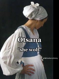 a woman wearing a white and blue dress with the words otsana she wolf