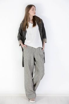 "Wide leg linen pants for a women, who always seeks to feel at her best, available in plus size. Linen pants with elastic waistband and pockets made of the organic linen fabric for your aesthetic clothing. Homemade with love and care Oeko-tex certified 100% linen loose pants which are crafted by local tailors in Lithuania (EU member). They go perfectly with any of our blouses (you will find below some recommendations)! Look sharp all day long! Pockets: side seam Waistband: elastic Details: *100% Relaxed Baggy Pants For Fall, Relaxed Baggy Wide Leg Pants With Pockets, Baggy Flax Pants With Pockets, Baggy Linen Bottoms With Side Pockets, Baggy Wide Leg Pants With Pockets, Ankle-length Linen Harem Pants With Pockets, Relaxed Fit Linen Pants With Elastic Waistband, Relaxed Wide-leg Harem Pants With Pockets, Relaxed Fit Linen Harem Pants For Fall