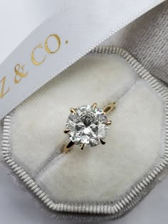 an engagement ring with a diamond in it