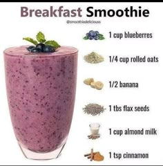 a smoothie in a glass with blueberries and other ingredients to make it into a smoothie