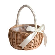 a wicker basket with a white ribbon tied around the handle and a bow on top