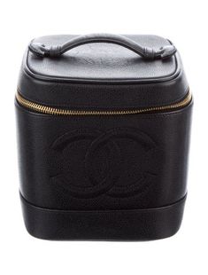 Chanel Cosmetic BagFrom the 1994-1996 Collection by Karl LagerfeldVintageBlack LeatherInterlocking CC LogoGold-Tone HardwareLeather Lining & Single Interior PocketExposed Zip ClosureUnfortunately, due to restrictions, this item may not be eligible for shipping in all areas. Chanel Vanity Case, Chanel Vanity, Chanel Cosmetics, Vanity Case, Cosmetic Bag, Vanity, Chanel, Women Accessories, Dressing Table