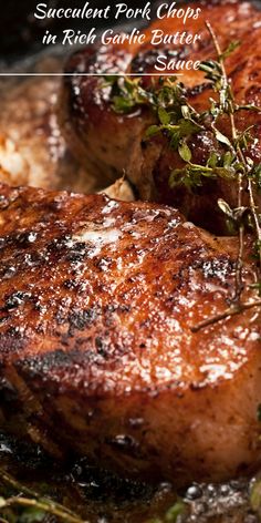 two steaks are cooking in a pan with herbs on top and the words, succulent pork chops in rich garlic butter sauce