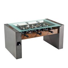 a table with a glass top and foosball in the middle on an isolated white background