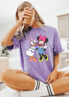 Our most popular designs pressed on a mineral wash, boyfriend fitting comfort tee. Don't see the color option you want? Select white then type the name of the color you want in the space provided. Disney World Outfit Ideas, Disney Bound Outfits Casual, Minnie And Daisy, Daisy Vintage, Minnie Mouse Shirt, Bibbidi Bobbidi Boo, Mickey Mouse Pictures, Vintage Friends, Mouse Pictures