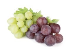 grapes and leaves on a white background with clippings to the side for text