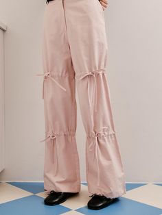 These are high-waisted trousers that offer a modern twist with drawstring details above the knee, creating a gathered look. The straight-leg cut provides a sleek silhouette, while the drawstrings add an adjustable, personalized fit around the legs. These trousers feature a clean, flat front with a concealed fastening, and the hem is finished with small hardware, possibly for cinching or decorative purposes.- The drawstring accents give these trousers a contemporary, casual feel.- Their high-waisted design is flattering and pairs well with tucked-in tops or cropped styles.- The trousers blend functional elements with style, suitable for fashion-forward casual wear. Future Style, Cropped Style, High Waisted Trousers, Drawstring Pants, Design Inspo, Aesthetic Clothes, Fashion Inspo Outfits, The Knee, Fashion Forward