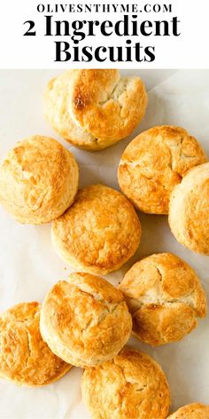 some biscuits that are sitting on top of a white paper with the words, two ingredient biscuits