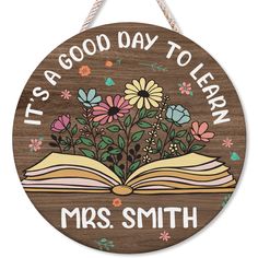 a wooden sign that says it's a good day to learn, mrs smith