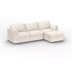 a white couch with a chaise lounger on the bottom right side and an ottoman in the middle