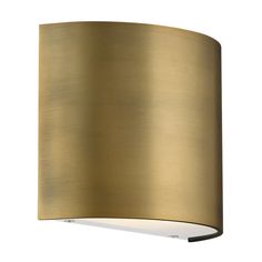 a wall light with a gold shade on the top and bottom part of it's arm