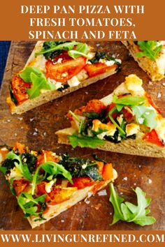 four slices of pizza with spinach and feta on a cutting board next to the words, deep pan pizza with fresh tomatoes, spinach and feta