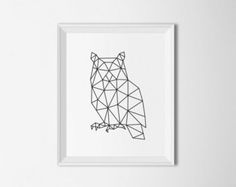 a black and white photo of an animal made out of geometric lines on the wall