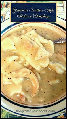 a white plate topped with dumplings covered in gravy