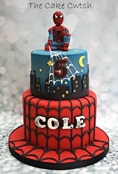 a spiderman birthday cake with the name cole on it's top and bottom tier