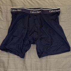 Brand New Navy Blue Calvin Klein Boxer Briefs Size M. Microfiber Technology, 90% Polyester And 10% Elastane. Brand New, Never Worn. Without Tags. Still Clean And In Perfect Condition In Accordance To Poshmarks Policies. Bundle Up To Save! Blue Stretch Boxer Briefs For Loungewear, Blue Stretch Boxer Briefs With Short Leg, Fitted Blue Short Boxer Briefs, Blue Multi-pack Boxer Briefs, Sporty Blue Boxer Briefs For Loungewear, Casual Blue Boxer Briefs With Short Leg, Blue Fitted Bottoms Multi-pack, Fitted Blue Bottoms Multi-pack, Casual Blue Short Leg Boxer Briefs