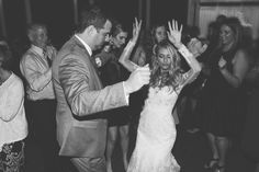 a bride and groom dancing at their wedding reception