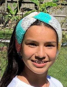 This is a very sweet  turban style headband that is so popular with young girls (and some not so young ones too!).  The colors are teal, coral, soft yellow and a marled gray and white. Approximately 19.5 " in circumference and  3.5 "wide, should fit most teens or adult women with 21-22" head size.  Hand made with a very soft high quality variegated acrylic yarn.  It is double-knitted so it is thick, chunky and warm.  Machine wash and dry (gentle/delicate settings).  Handwashing and laying out fl Headband Knit, Twisted Headband, Headband Turban, Teal Coral, Style Headband, Knit Headband, Turban Style, Soft Yellow, Ear Warmer