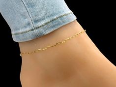 Paperclip anklet/ 10K fully solid gold chain anklet/ gold rectangle link chain Details: Weight: 1.3gr (10 inch) Width: 2mm Length: 9.0, 9.5,  10, 10.5, 11, 11.5, 12, inches Should you have any questions please feel free to contact us, our team is more than happy to provide prompt assistance. Cheap Gold Metal Anklets, Adjustable Gold Plated Anklets, Gold Metal Anklet With Adjustable Chain, Gold-plated Adjustable Anklets, Elegant Adjustable 14k Gold-filled Anklets, Solid Gold Chains, Gold Gift, Chain Anklet, Anklet Jewelry