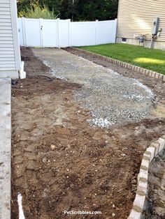 the backyard is ready to be filled with gravel