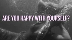 a woman swimming under water with the words are you happy with yourself?