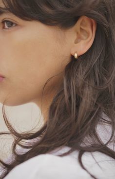 Cast stud hoop earrings with an organic textured surface. A simple statement earring that looks great layered with other styles.Please note: May be heavy for sensitive ears Recycled brass with sterling silver studs coated in a thick layer of high grade 14k gold. Handmade in the USA using sustainable earth-friendly materials. Textured Hoop Earrings, Minimal Jewelry Earrings, Minimal Gold Earrings, Subtle Earrings, Minimalistic Earrings, Minimalist Earring, Minimal Earrings, Golden Earrings, Quick Outfits