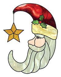 a stained glass christmas ornament with santa's hat and star hanging from it