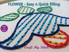 a close up of a embroidery pattern on a piece of cloth with the words flower - easy quick filling