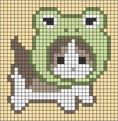 a cross stitch pattern with a dog in the middle