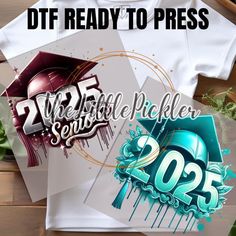 some t - shirts are laying on top of each other with the words dft ready to press