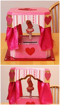 this is an image of a dollhouse made out of paper and cardboard with hearts on it