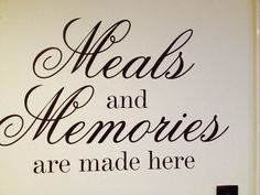 there is a wall decal that says meals and memories are made here