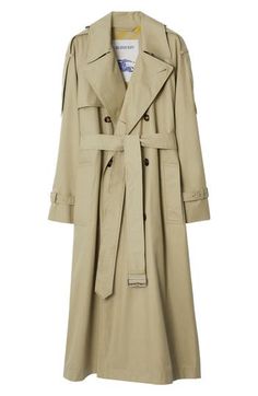 A signature trench coat is cut in an oversized silhouette from breathable, water-resistant cotton gabardine with elongated epaulets. The undercollar and lining are patterned in Burberry house check. 50 1/2" length (size 12) Double-breasted button closure Notched lapels Belted cuffs Front welt pockets Epaulets Gun flap; storm flap Removable belt Back button-up vent Lined 100% cotton Dry clean Made in the UK Designer Clothing Trench Coat Design, Burberry Shorts, Executive Fashion, Burberry Trench Coat, Coat Outfits, Coat Design, Trench Coats Women, Burberry Women, Oversized Silhouette