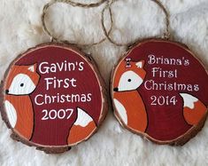 two wood slices with the words gavin's first christmas 2007 and an image of a fox