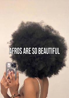 a woman taking a selfie with an afro on her phone and the words afros are so beautiful