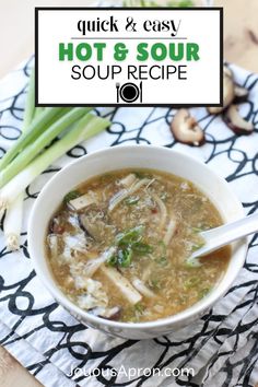 a bowl of soup with mushrooms and celery in it on top of a table