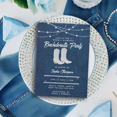 a blue and white dinner plate with a card on it that says bachelor party in the middle