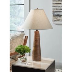 a lamp that is on top of a table