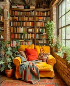 a living room filled with lots of books and plants