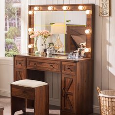 a wooden vanity with lights on it and a stool in front of the mirror,