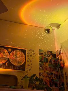 the ceiling is decorated with many pictures and lights, including an image of pizzas