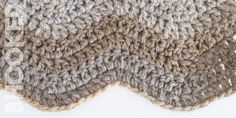 a close up view of a crocheted dishcloth