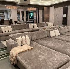 a large sectional couch in a living room