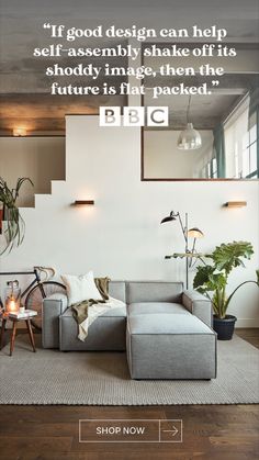 a living room with white walls and wooden flooring, an l shaped sofa is featured in the ad