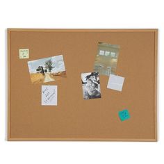 a cork board with pictures and post it notes on it