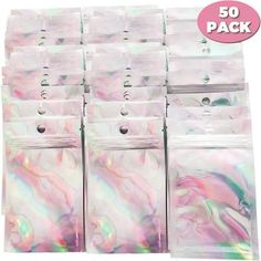 10 bags of holographics in clear plastic with white and pink swirl designs