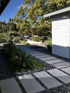 a walkway made out of stones and gravel