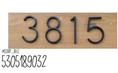 a wooden sign with the number 3815 on it