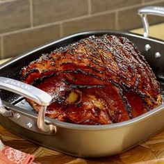 a large roasting pan with ribs in it